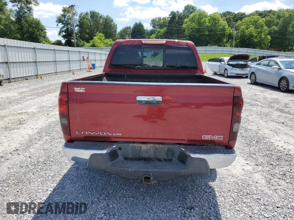 2011 GMC Canyon SLT with VIN 1GTH6NFE6B8109679, listed as a Copart auction lot 55540214 with 159,969 mi miles and Salvage Title. Bid and sale history available at carsss.com. Image 6.