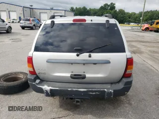 2004 Jeep Grand Cherokee Laredo z VIN 1J4GW48S14C288605, wystawiony jako Copart lot #60204815 z przebiegiem 247 816 mil mil oraz Szkoda całkowita • Salvage title. Historia ofert i sprzedaży dostępna na DreamBid. Obrazek 6.