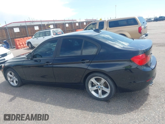 2014 BMW 3 Series 328i xDrive with VIN WBA3B3C56EJ981322, listed as a IAAI auction lot 42104530 with 104,376 mi miles. Bid and sale history available at carsss.com. Image 14.