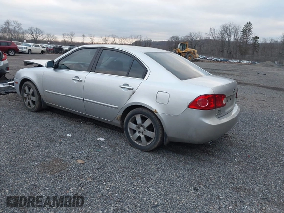 2007 Kia Optima EX with VIN KNAGE124375162317, listed as a IAAI auction lot 41246445 with 174,128 mi miles. Bid and sale history available at carsss.com. Image 3.
