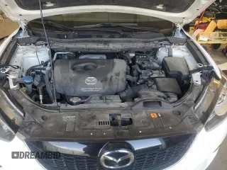 2015 Mazda CX-5 Grand Touring with VIN JM3KE4DY5F0538016, listed as a Copart auction lot 52396685 with 137,272 mi miles and Clean Title. Bid and sale history available at carsss.com. Image 12.