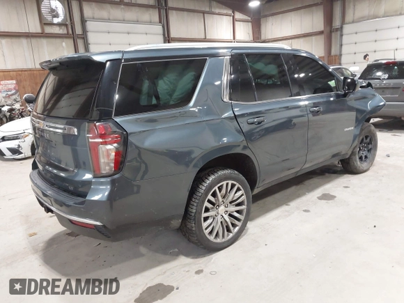 2021 Chevrolet Tahoe LT z VIN 1GNSKNKD5MR354265, wystawiony jako IAAI lot #42331890 z przebiegiem 106 250 mil mil oraz . Historia ofert i sprzedaży dostępna na DreamBid. Obrazek 4.