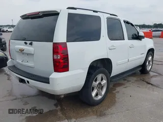 2007 Chevrolet Tahoe LT z VIN 1GNFC13027R112945, wystawiony jako IAAI lot #42178102 z przebiegiem 202 858 mil mil oraz . Historia ofert i sprzedaży dostępna na DreamBid. Obrazek 4.