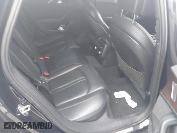 2016 Audi S6 Prestige z VIN WAUH2AFC4GN177293, wystawiony jako IAAI lot #41549559 z przebiegiem 79 715 mil mil oraz . Historia ofert i sprzedaży dostępna na DreamBid. Obrazek 8.