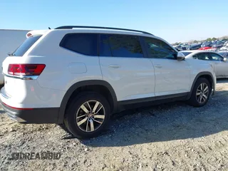 2023 Volkswagen Atlas SE with VIN 1V2DP2CA0PC544616, listed as a IAAI auction lot 41144129 with 23,099 mi miles and . Bid and sale history available at DreamBid. Image 4.