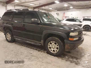 2004 Chevrolet Tahoe LS with VIN 1GNEK13T24R242907, listed as a IAAI auction lot 41496795 with 261,402 mi miles. Bid and sale history available at carsss.com. Image 1.