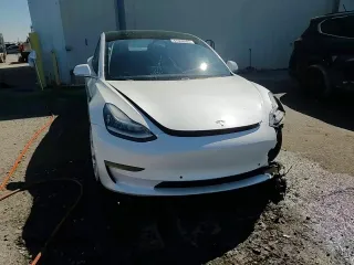 2020 Tesla Model 3 Standard Range Plus with VIN 5YJ3E1EA6LF661513, listed as a Copart auction lot 47008985 with 128,362 mi miles and Non Repairable. Bid and sale history available at DreamBid. Image 13.