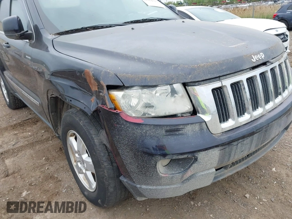 2011 Jeep Grand Cherokee Laredo with VIN 1J4RR4GG9BC608778, listed as a IAAI auction lot 42314313 with 151,780 mi miles and . Bid and sale history available at DreamBid. Image 13.