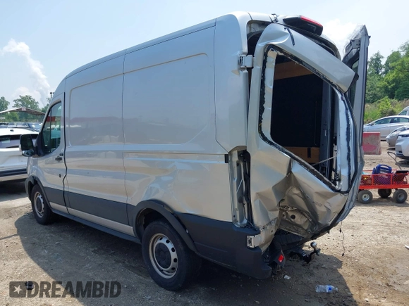 2021 Ford Transit z VIN 1FTYE1CG8MKA98319, wystawiony jako IAAI lot #42265312 z przebiegiem 85 302 mil mil oraz . Historia ofert i sprzedaży dostępna na DreamBid. Obrazek 3.