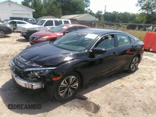 2016 Honda Civic EX-L z VIN 19XFC1F74GE041373, wystawiony jako IAAI lot #42201565 z przebiegiem 122 069 mil mil oraz . Historia ofert i sprzedaży dostępna na DreamBid. Obrazek 2.