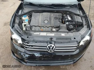 2013 Volkswagen Passat SE with VIN 1VWBP7A33DC114324, listed as a IAAI auction lot 41609521 with 110,229 mi miles. Bid and sale history available at carsss.com. Image 10.