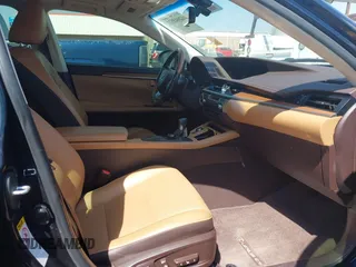 2016 Lexus ES 300h with VIN JTHBW1GG3G2111462, listed as a IAAI auction lot 42043572 with 92,363 mi miles and . Bid and sale history available at DreamBid. Image 5.