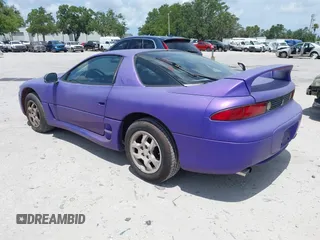 1999 Mitsubishi 3000GT z VIN JA3AM44H8XY003108, wystawiony jako IAAI lot #42374035 z przebiegiem 177 637 mil mil oraz . Historia ofert i sprzedaży dostępna na DreamBid. Obrazek 3.