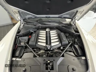 2010 Rolls-Royce Ghost z VIN SCA664S57AUX48643, wystawiony jako Copart lot #83959114 z przebiegiem 52 605 mil mil oraz Tytuł czysty. Historia ofert i sprzedaży dostępna na DreamBid. Obrazek 7.