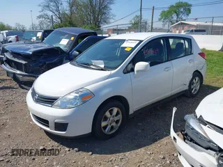 2012 Nissan Versa S with VIN 3N1BC1CPXCK212600, listed as a IAAI auction lot 41918424 with 104,483 mi miles. Bid and sale history available at carsss.com. Image 2.