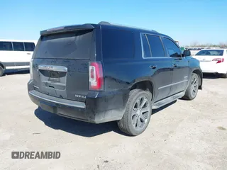 2016 GMC Yukon Denali with VIN 1GKS2CKJ8GR337441, listed as a IAAI auction lot 41485647 with 171,874 mi miles. Bid and sale history available at carsss.com. Image 4.