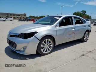 2013 Toyota Avalon XLE with VIN 4T1BK1EB3DU025424, listed as a Copart auction lot 65730715 with 157,911 mi miles and Salvage title. Bid and sale history available at DreamBid. Image 1.