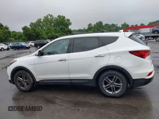 2017 Hyundai Santa Fe 2.4L with VIN 5XYZUDLB0HG397831, listed as a IAAI auction lot 42496341 with 96,333 mi miles and . Bid and sale history available at DreamBid. Image 14.