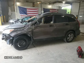 2011 Honda CR-V LX z VIN 5J6RE3H31BL028894, wystawiony jako Copart lot #56021585 z przebiegiem 191 217 mil mil oraz Czysty tytuł • Clean title. Historia ofert i sprzedaży dostępna na DreamBid. Obrazek 1.