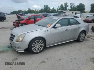 2010 Cadillac CTS Performance z VIN 1G6DL5EV6A0108296, wystawiony jako Copart lot #60771145 z przebiegiem 142 481 mil mil oraz Czysty tytuł • Clean title. Historia ofert i sprzedaży dostępna na DreamBid. Obrazek 1.