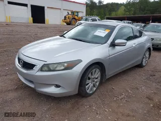 2010 Honda Accord Cpe EX-L with VIN 1HGCS2B87AA004579, listed as a IAAI auction lot 41813326 with 220,908 mi miles. Bid and sale history available at carsss.com. Image 2.