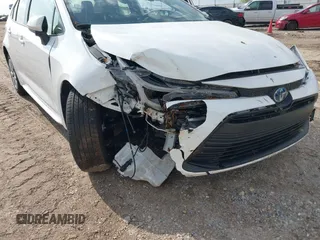 2024 Toyota Corolla Hybrid LE with VIN JTDBCMFE3R3048792, listed as a IAAI auction lot 41915869 with 22,899 mi miles. Bid and sale history available at carsss.com. Image 6.