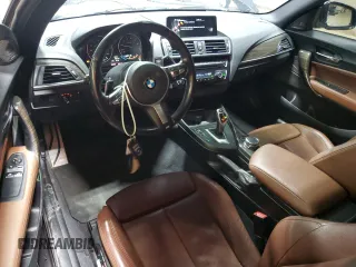 2016 BMW 2 Series M235i xDrive with VIN WBA1J9C51GV372003, listed as a Copart auction lot 83413884 with 104,951 mi miles and Salvage Title. Bid and sale history available at carsss.com. Image 8.