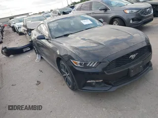 2016 Ford Mustang EcoBoost z VIN 1FA6P8THXG5267039, wystawiony jako IAAI lot #42014319 z przebiegiem 103 936 mil mil oraz . Historia ofert i sprzedaży dostępna na DreamBid. Obrazek 1.