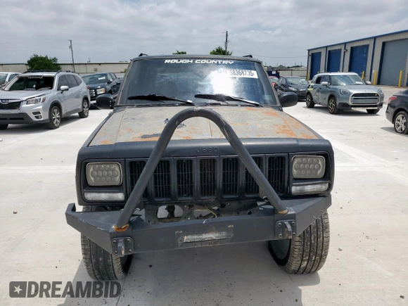 1998 Jeep Cherokee Sport z VIN 1J4FJ68S8WL193483, wystawiony jako Copart lot #58368705 z przebiegiem 94 462 mil mil oraz Szkoda całkowita • Salvage title. Historia ofert i sprzedaży dostępna na DreamBid. Obrazek 5.