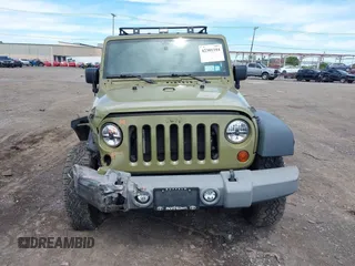 2013 Jeep Wrangler Unlimited Sport z VIN 1C4BJWDG0DL577812, wystawiony jako IAAI lot #42301104 z przebiegiem 138 387 mil mil oraz . Historia ofert i sprzedaży dostępna na DreamBid. Obrazek 12.