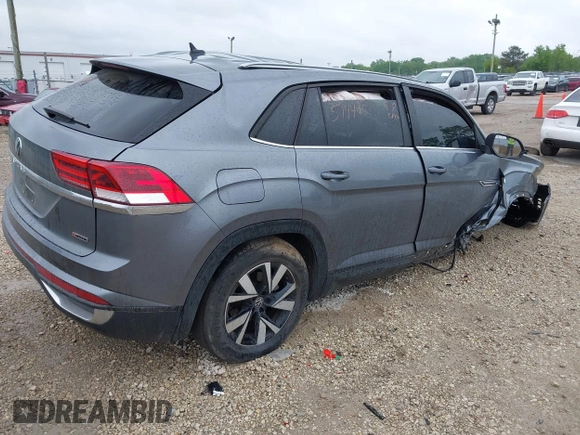 2022 Volkswagen Atlas SE with VIN 1V2LC2CA1NC203536, listed as a IAAI auction lot 42310598 with 28,724 mi miles and . Bid and sale history available at DreamBid. Image 4.
