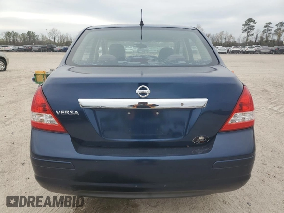 2009 Nissan Versa 1.8 S with VIN 3N1BC11E49L500200, listed as a Copart auction lot 87227464 with 215,170 mi miles and Salvage Title. Bid and sale history available at carsss.com. Image 6.