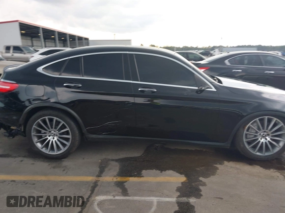 2019 Mercedes-Benz GLC 300 with VIN WDC0J4KB0KF667213, listed as a IAAI auction lot 40422288 with 56,488 mi miles and . Bid and sale history available at DreamBid. Image 13.
