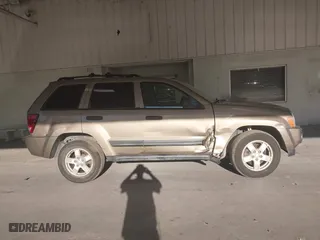 2005 Jeep Grand Cherokee Laredo with VIN 1J8HR48N95C713185, listed as a IAAI auction lot 41777242 with 95,262 mi miles. Bid and sale history available at carsss.com. Image 13.
