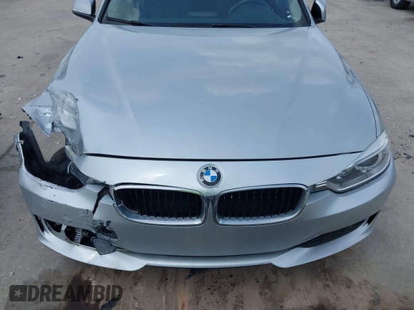 2013 BMW 3 Series 328i with VIN WBA3C1C59DK105001, listed as a IAAI auction lot 41923155 with 73,810 mi miles. Bid and sale history available at carsss.com. Image 13.