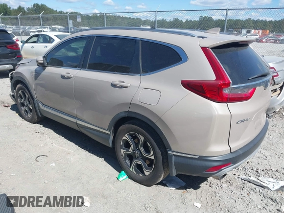 2018 Honda CR-V Touring with VIN 5J6RW1H98JL000031, listed as a IAAI auction lot 40605651 with 129,516 mi miles and . Bid and sale history available at DreamBid. Image 3.