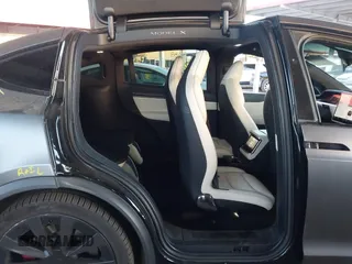 2022 Tesla Model X Plaid z VIN 7SAXCBE69NF352875, wystawiony jako IAAI lot #41964970 z przebiegiem 34 065 mil mil oraz . Historia ofert i sprzedaży dostępna na DreamBid. Obrazek 8.
