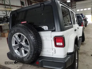2021 Jeep Wrangler Unlimited Sahara with VIN 1C4HJXEG2MW655357, listed as a IAAI auction lot 41724695 with 37,644 mi miles and . Bid and sale history available at DreamBid. Image 16.