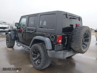 2015 Jeep Wrangler Unlimited Willys Wheeler with VIN 1C4BJWDG5FL649462, listed as a IAAI auction lot 41543181 with NaN miles. Bid and sale history available at carsss.com. Image 3.