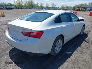 2018 Chevrolet Malibu LT z VIN 1G1ZD5ST7JF113869, wystawiony jako IAAI lot #42188467 z przebiegiem 104 531 mil mil oraz . Historia ofert i sprzedaży dostępna na DreamBid. Obrazek 4.