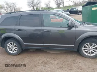 2017 Dodge Journey SXT z VIN 3C4PDDBG0HT540757, wystawiony jako IAAI lot #42104065 z przebiegiem 116 059 mil mil oraz . Historia ofert i sprzedaży dostępna na DreamBid. Obrazek 13.