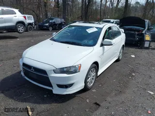 2010 Mitsubishi Lancer ES with VIN JA32U2FU9AU027824, listed as a IAAI auction lot 41992311 with 239,422 mi miles. Bid and sale history available at carsss.com. Image 2.