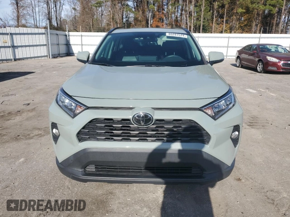 2020 Toyota RAV4 XLE Premium with VIN 2T3C1RFV6LW059183, listed as a Copart auction lot 85281574 with 91,402 mi miles and Salvage Title. Bid and sale history available at carsss.com. Image 5.