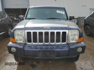 2010 Jeep Commander Sport with VIN 1J4RG4GK5AC119433, listed as a Copart auction lot 87657265 with 212,973 mi miles and Salvage title. Bid and sale history available at DreamBid. Image 5.