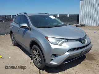 2018 Toyota RAV4 XLE z VIN 2T3WFREVXJW420797, wystawiony jako IAAI lot #41989835 z przebiegiem 78 169 mil mil oraz . Historia ofert i sprzedaży dostępna na DreamBid. Obrazek 1.