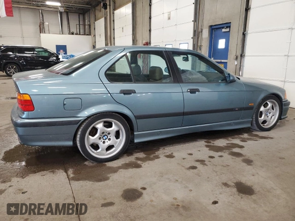 1997 BMW M3 with VIN WBSCD0325VEE12385, listed as a Copart auction lot 61494375 with 131,384 mi miles and Clean title. Bid and sale history available at DreamBid. Image 3.