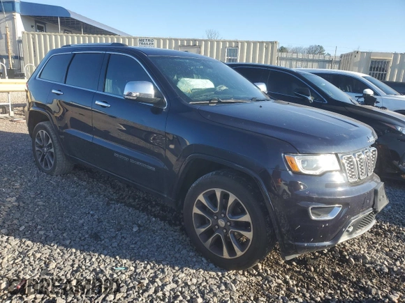 2017 Jeep Grand Cherokee Overland with VIN 1C4RJFCG1HC778818, listed as a Copart auction lot 87368764 with 62,471 mi miles and Salvage Title. Bid and sale history available at carsss.com. Image 4.