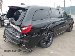 2021 Dodge Durango R/T with VIN 1C4SDHCT5MC660105, listed as a IAAI auction lot 42373172 with 75,227 mi miles and . Bid and sale history available at DreamBid. Image 4.