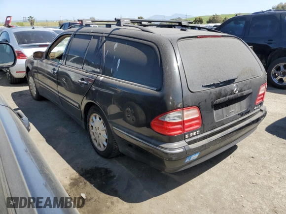 2001 Mercedes-Benz E-Class AWD with VIN WDBJH82J71X051634, listed as a Copart auction lot 51299544 with 286,211 mi miles and Salvage Title. Bid and sale history available at carsss.com. Image 2.