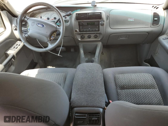 2005 Ford Explorer Sport Trac XLS with VIN 1FMZU67K65UA29830, listed as a Copart auction lot 54941185 with 214,220 mi miles and Salvage title. Bid and sale history available at DreamBid. Image 8.